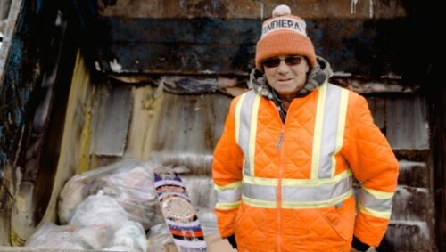 City waste trucks operating under a municipal waste management system with optimized routes and schedules.