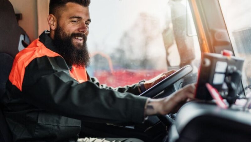 Waste truck driver using in-cab navigation